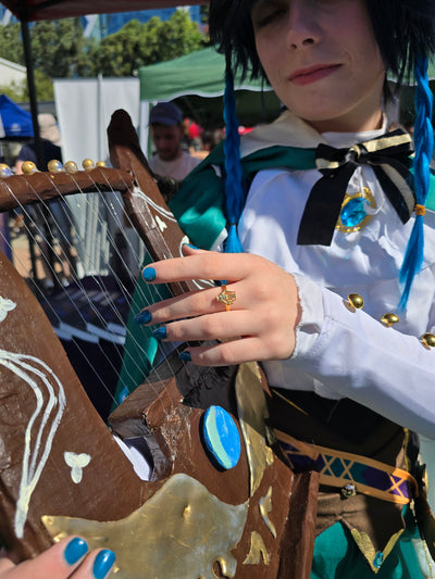 Venti Lyre Ring with Topaz